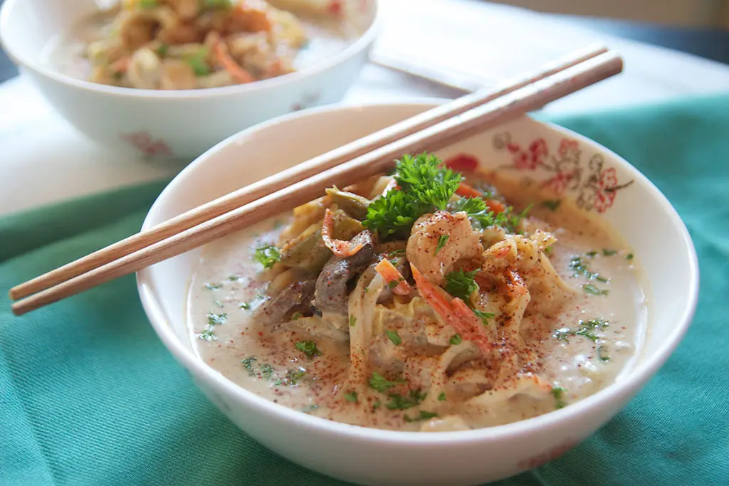 Coconut Curry Soup at Pinch Me, I'm Eating! This creamy, tangy coconut curry soup is full of vegetables and goodies and has just enough kick to keep it interesting!