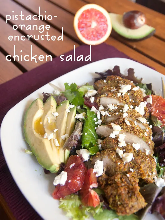 Pistachio-orange encrusted chicken salad - Simple to make with a complex taste! Aromatic orange and pistachio complements the chicken, while the pungent and tangy goat cheese balances out the sweetness of the dressing. | pinchmeimeating.com