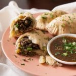 Get a taste of South America with these Argentine beef, potato, and onion empanadas. Serve them with chimichurri! | www.pinchmeimeating.com