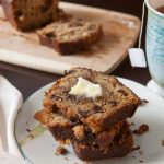 The moistest, meltiest, most delicious banana nut chocolate chip bread you'll ever taste. Quick and easy to make, it's great for breakfast AND dessert! | www.pinchmeimeating.com