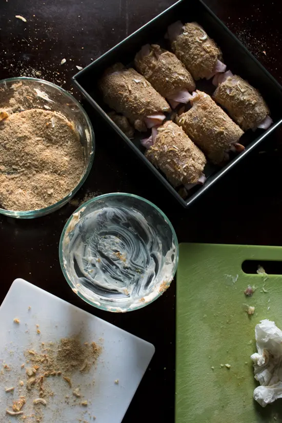 With ham, swiss, and a flavorful breading, this easy chicken cordon bleu is simple enough to make on a weeknight and fancy enough for a romantic Valentine's Day dinner! You can even make ahead of time and bake the day of. It's so juicy and flavorful! | www.pinchmeimeating.com