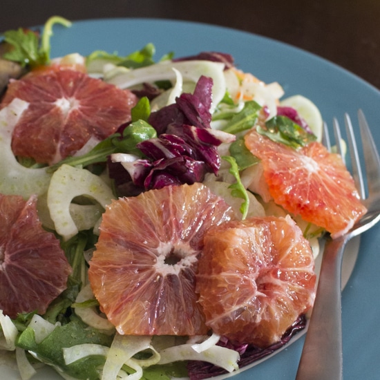 This fennel blood orange salad with arugula is fresh and healthy with peppery greens, crunchy fennel bulbs, and sweet, juicy blood oranges tossed in a simple vinaigrette. Great for clean eating! Make it a full meal with some added chicken sausage!