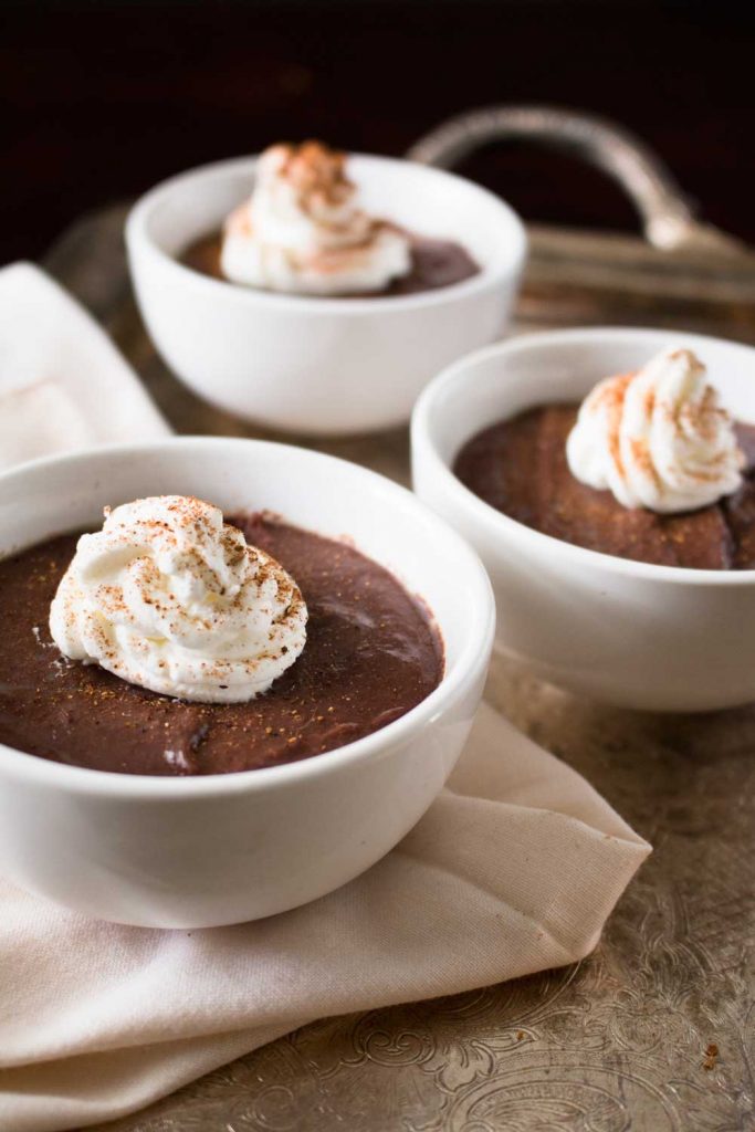 Chinese Five Spice Chocolate Pots de Creme - Smooth custard is infused with a blend of anise, cloves, cinnamon, fennel, and pepper. A romantic make-ahead dessert perfect for Valentine's Day. | www.pinchmeimeating.com