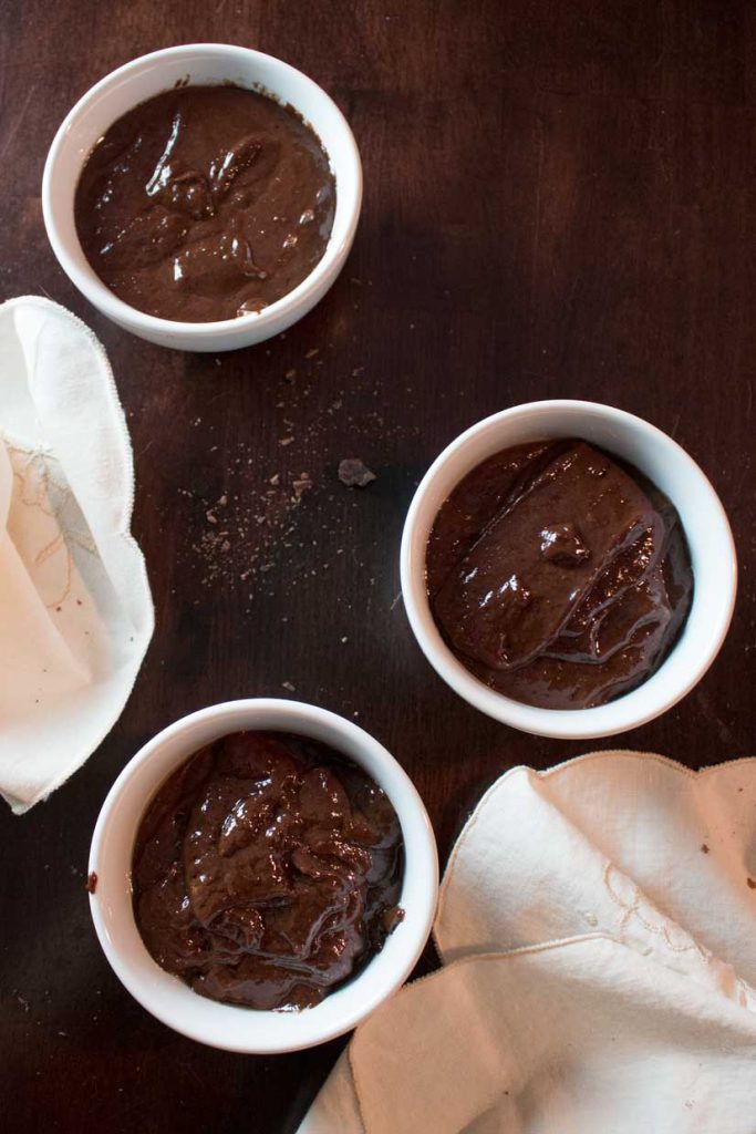 Chinese Five Spice Chocolate Pots de Creme - Smooth custard is infused with a blend of anise, cloves, cinnamon, fennel, and pepper. A romantic make-ahead dessert perfect for Valentine's Day. | www.pinchmeimeating.com