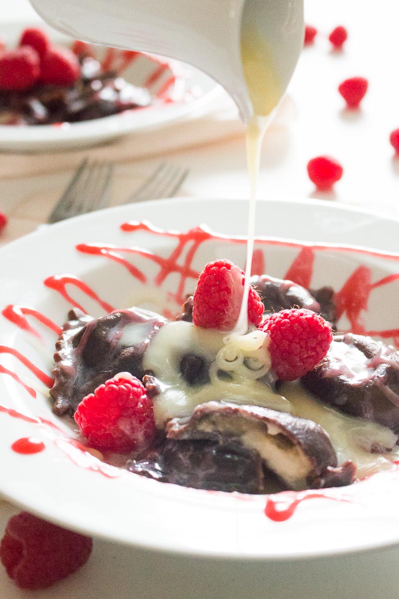 White Chocolate Mascarpone Chocolate Ravioli with Raspberry Sauce