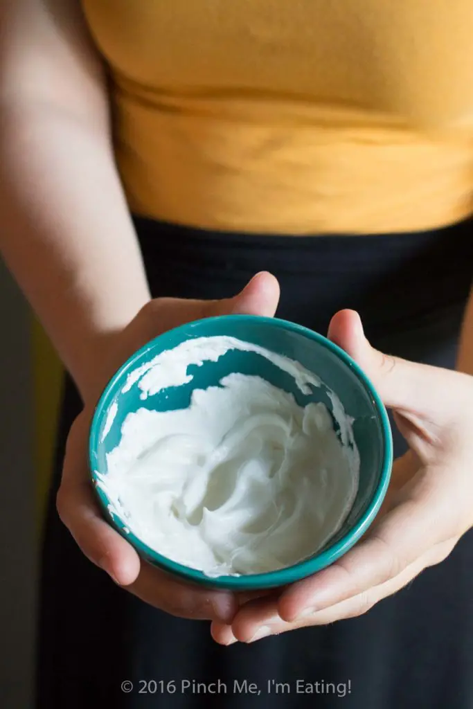 Skip the Cool Whip and the spray can! When all you need is a single serving, make this one-minute one-serving whipped cream with this dangerously easy trick! And there's no heavy kitchen equipment to wash afterwards! You'd never know fresh, homemade whipped cream was this quick or easy. I do this wayyy more often than I should! | www.pinchmeimeating.com