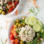 Inspired by a salad from the historic district of Old Montreal, this dinner salad is light, fresh, and perfect for dining al fresco at your own home! Topped with lemon tarragon chicken salad and a champagne vinaigrette. | www.pinchmeimeating.com