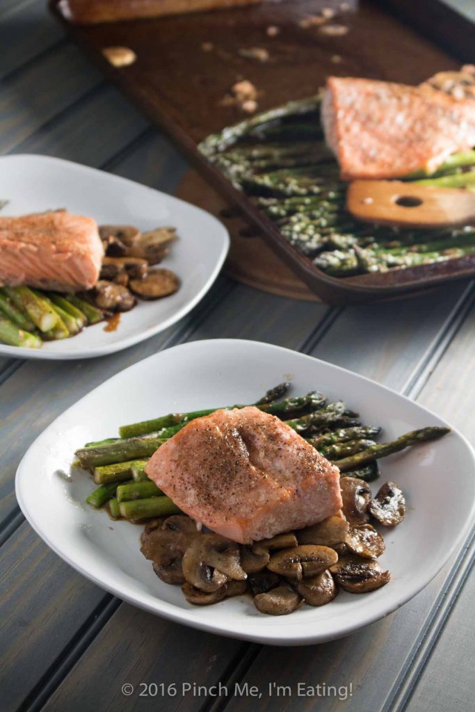 One-pan salmon with asparagus, mushrooms, and balsamic brown butter sauce is the easiest, most delicious dinner - and it's ready in only 20 minutes! This is my new favorite meal! | www.pinchmeimeating.com