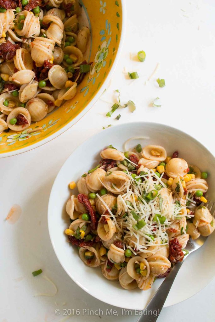 Sun-Dried Tomato Pasta Salad with Peas and Parmesan