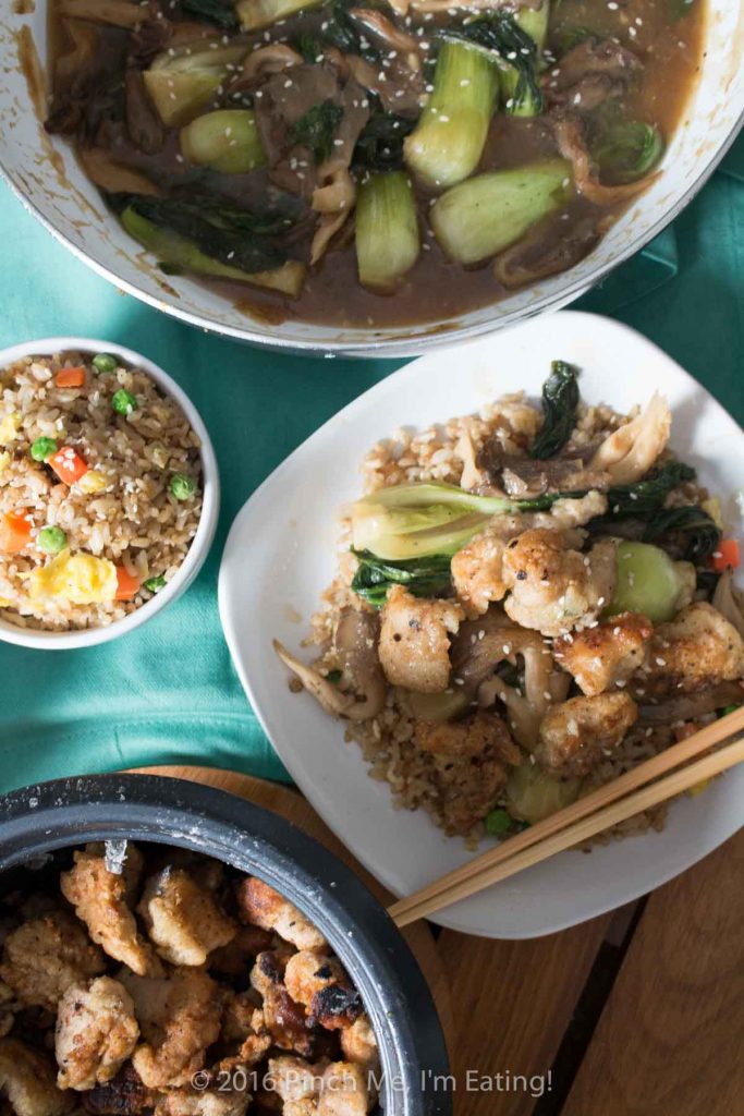 The quickest shallow-fried chicken bites served with adorable baby bok choy and oyster mushrooms in a brothy ginger-garlic sauce. So delicious! It's great with fried rice! | www.pinchmeimeating.com