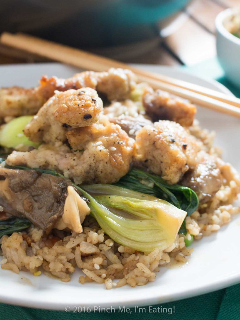 The quickest shallow-fried chicken bites served with adorable baby bok choy and oyster mushrooms in a brothy ginger-garlic sauce. So delicious! It's great with fried rice! | www.pinchmeimeating.com