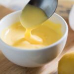 This easy Hollandaise sauce recipe doesn't require a blender, a double boiler, or constant whisking. If you want a thick, creamy, and tangy sauce that's easy to make and an easily-scalable recipe that's a cinch to memorize, give this one a shot! | www.pinchmeimeating.com