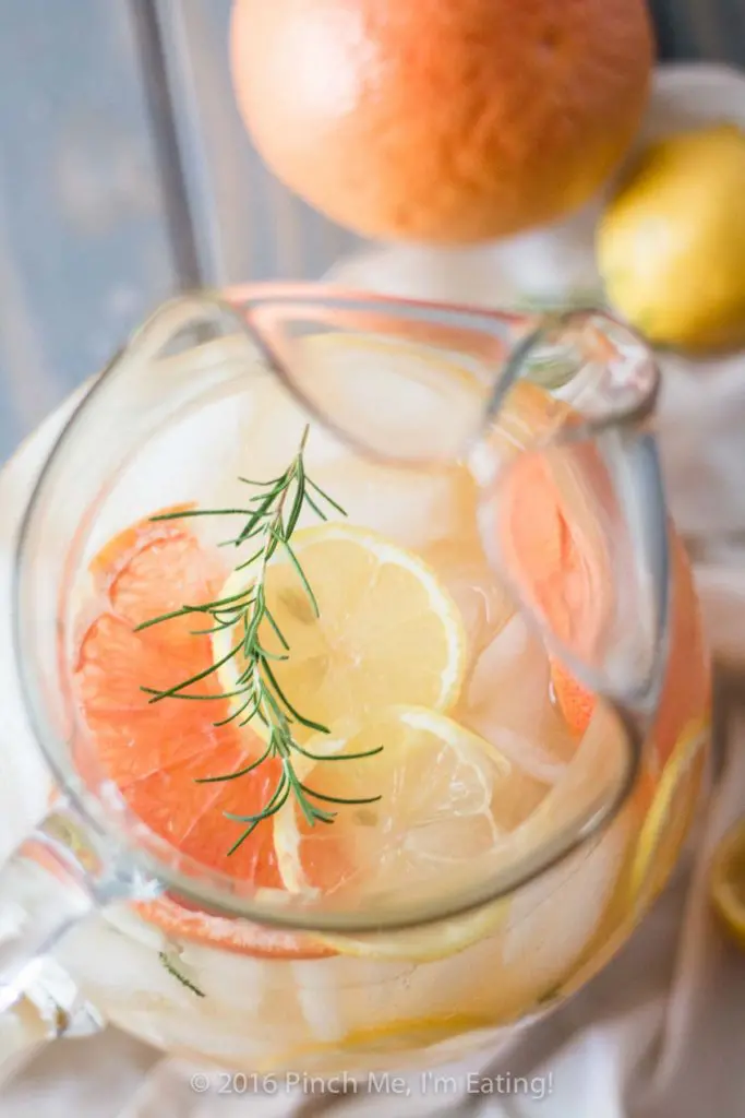 Grapefruit Rosemary Lemonade - A sweet, tangy, and fragrant twist on the classic summer drink. So refreshing! | www.pinchmeimeating.com