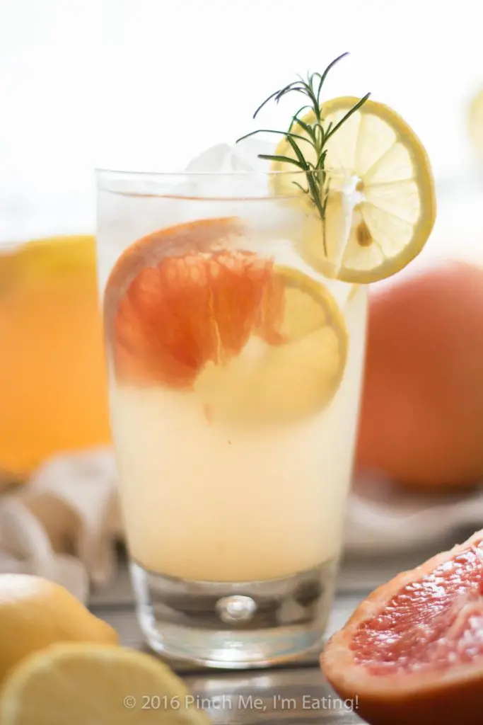 Grapefruit Rosemary Lemonade - A sweet, tangy, and fragrant twist on the classic summer drink. So refreshing! | www.pinchmeimeating.com