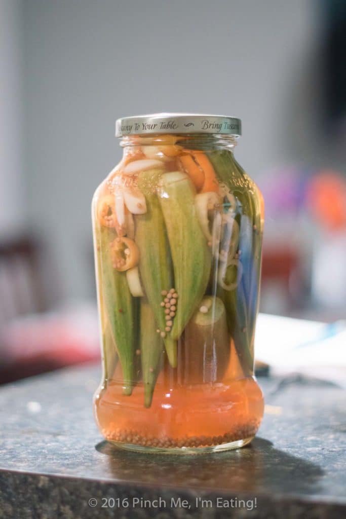 Easy refrigerator pickled okra is perfect for small batches! No canning experience necessary. Make these okra pickles two ways — sweet and tangy or hot and smoky! | www.pinchmeimeating.com