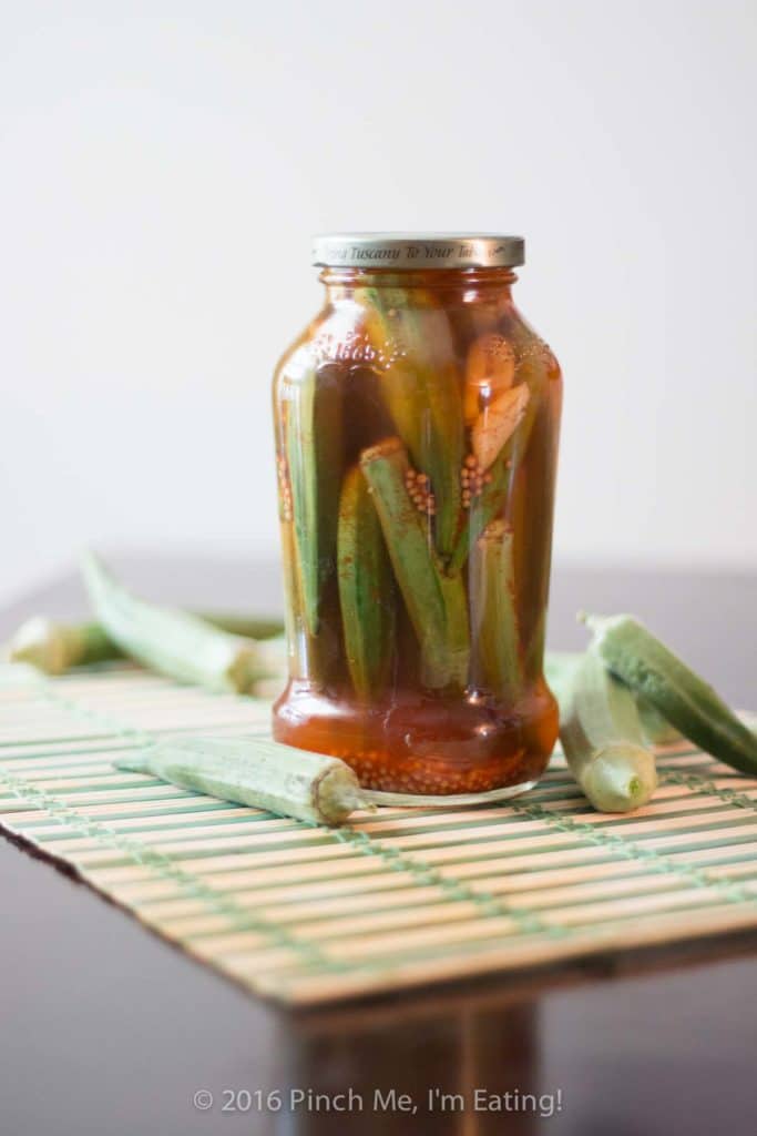 Easy refrigerator pickled okra is perfect for small batches! No canning experience necessary. Make these okra pickles two ways — sweet and tangy or hot and smoky! | www.pinchmeimeating.com