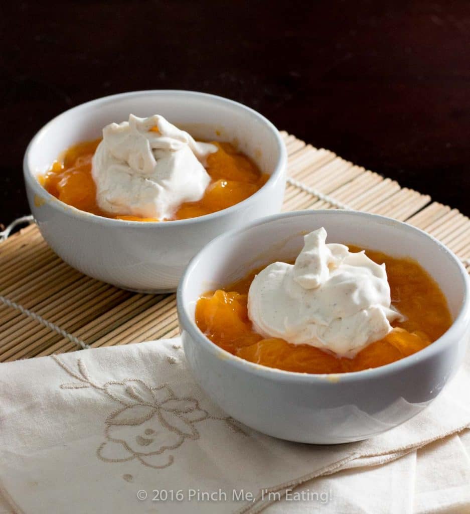 I want to eat this brown sugar cardamom whipped cream on everything! The flavored whipped cream is great with fresh persimmons, tea cake, scones, or in coffee, hot chocolate, or tea! | www.pinchmeimeating.com