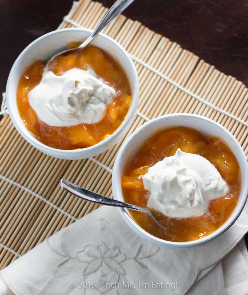 I want to eat this brown sugar cardamom whipped cream on everything! The flavored whipped cream is great with fresh persimmons, tea cake, scones, or in coffee, hot chocolate, or tea! | www.pinchmeimeating.com
