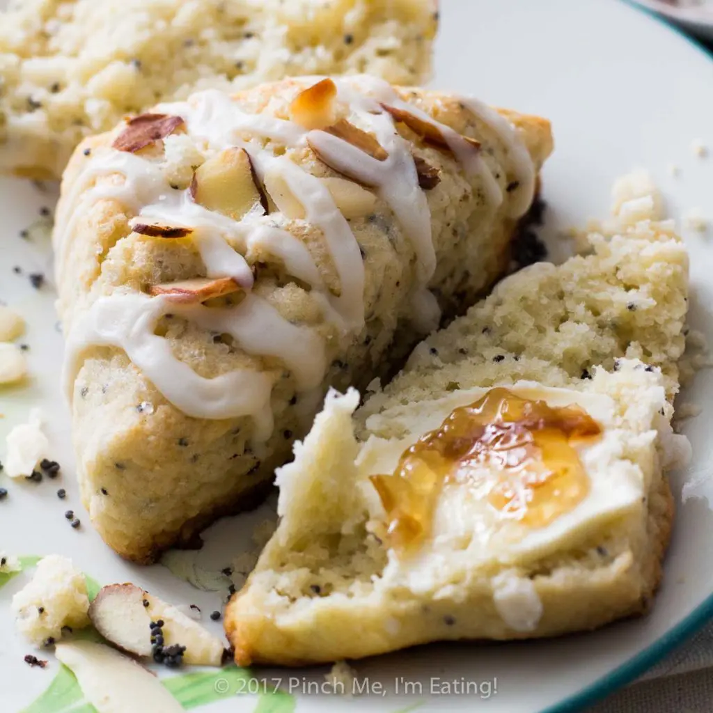 Almond poppy seed scones are a perfect companion to afternoon tea! Moist, dense, crumbly, and not overly sweet, they're a unique variation on the more common lemon poppy seed combination.