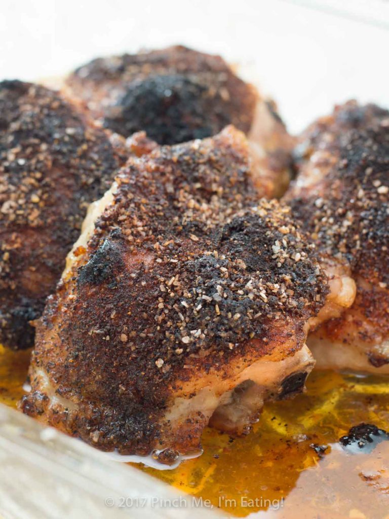 Covered in a delicious and simple sweet and spicy rub, these crispy baked chicken thighs are a satisfying, healthy, and easy main dish perfect for a weeknight dinner.