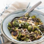 Pan-roasted lemon garlic Parmesan Brussels sprouts with pine nuts are an easy, healthy side dish you can make on the stove in about 15 minutes.