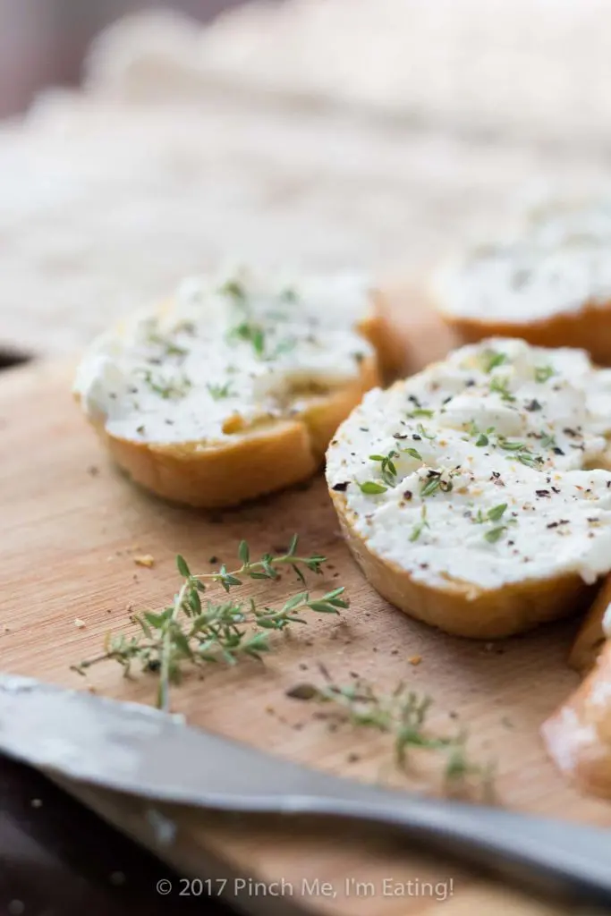 Ricotta crostini with blueberries, walnuts, honey, and thyme is an unexpected and delightful appetizer perfect for serving with wine and cheese!