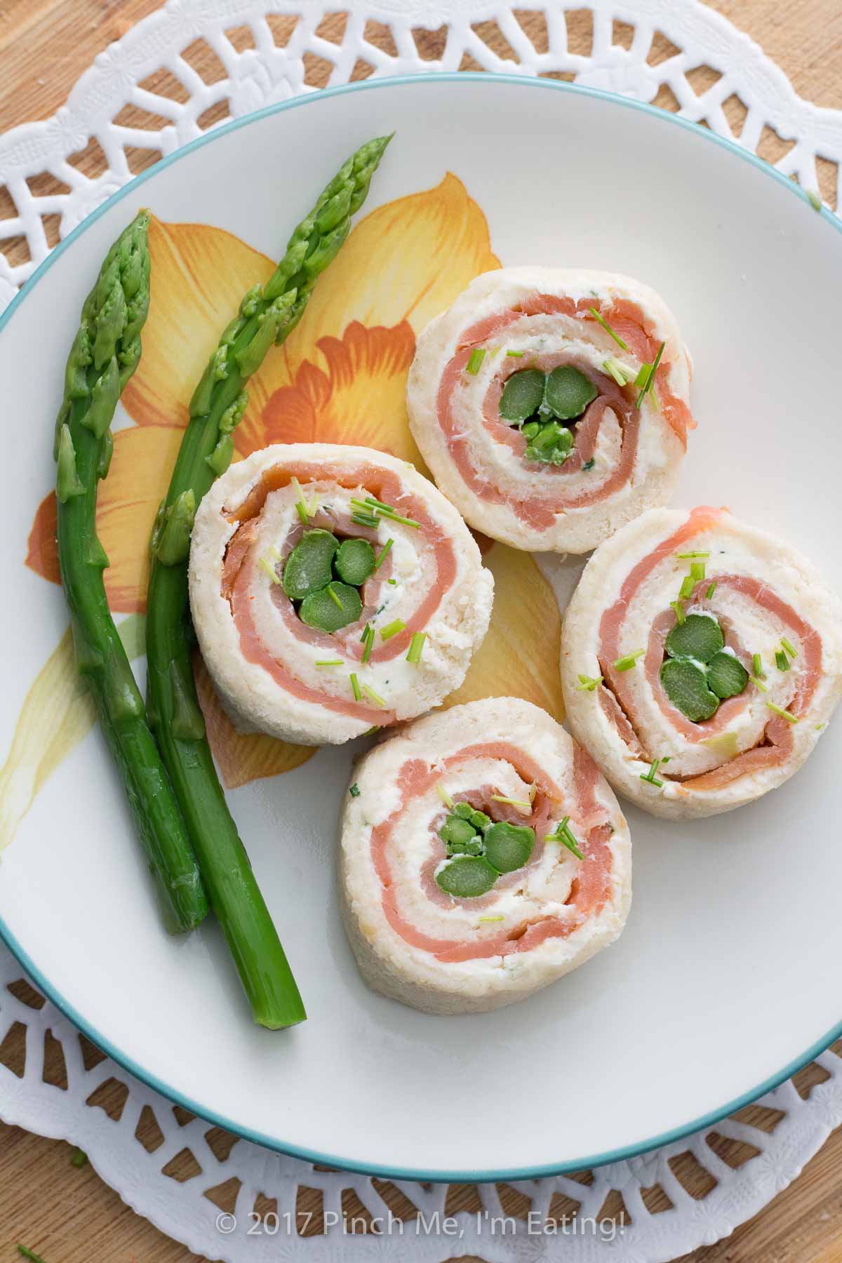 Asparagus and smoked salmon pinwheels with lemon chive cream cheese are the perfect tea sandwiches: beautiful, elegant, and flavorful! They're my favorite finger sandwiches!