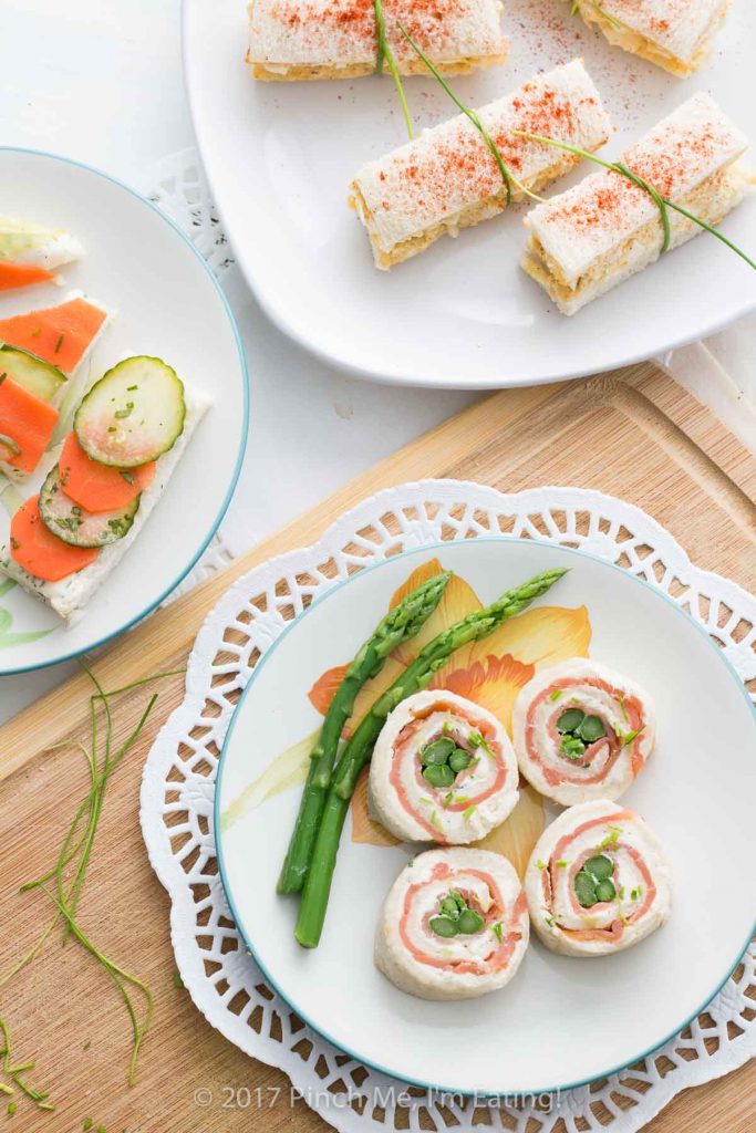 Asparagus and smoked salmon pinwheels with lemon chive cream cheese are the perfect tea sandwiches: beautiful, elegant, and flavorful! They're my favorite finger sandwiches!
