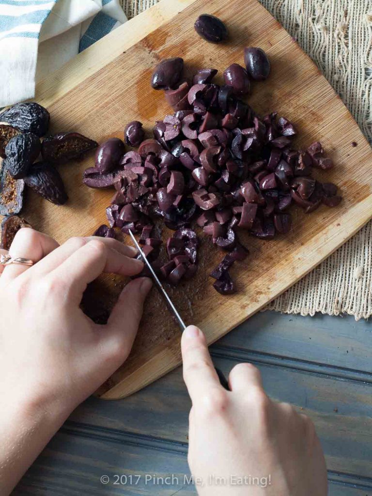 This velvety fig and olive tapenade makes an easy and elegant appetizer for a party or a date night in! You can pre-assemble it with cream cheese and walnuts on crostini or serve it spooned over cheese for guests to spread themselves.