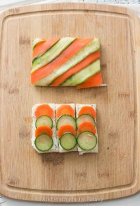 Open-faced marinated carrot and cucumber tea sandwiches with garlic herb butter are a beautiful and colorful twist on the quintessential finger sandwich!