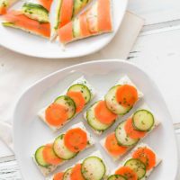 Open-faced marinated carrot and cucumber tea sandwiches with garlic herb butter are a beautiful and colorful twist on the quintessential finger sandwich!