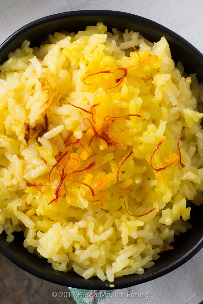 Rice cooker saffron rice is my little secret for spending NO TIME on a side dish that feels extra-fancy. With no additional prep time and just a couple extra ingredients, you can transform your plain white rice into an elegant and fragrant side dish!