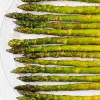 This simply prepared sweet onion oven roasted asparagus is a flavorful side dish that takes no time to whip up for a casual weeknight dinner and is elegant enough for company!