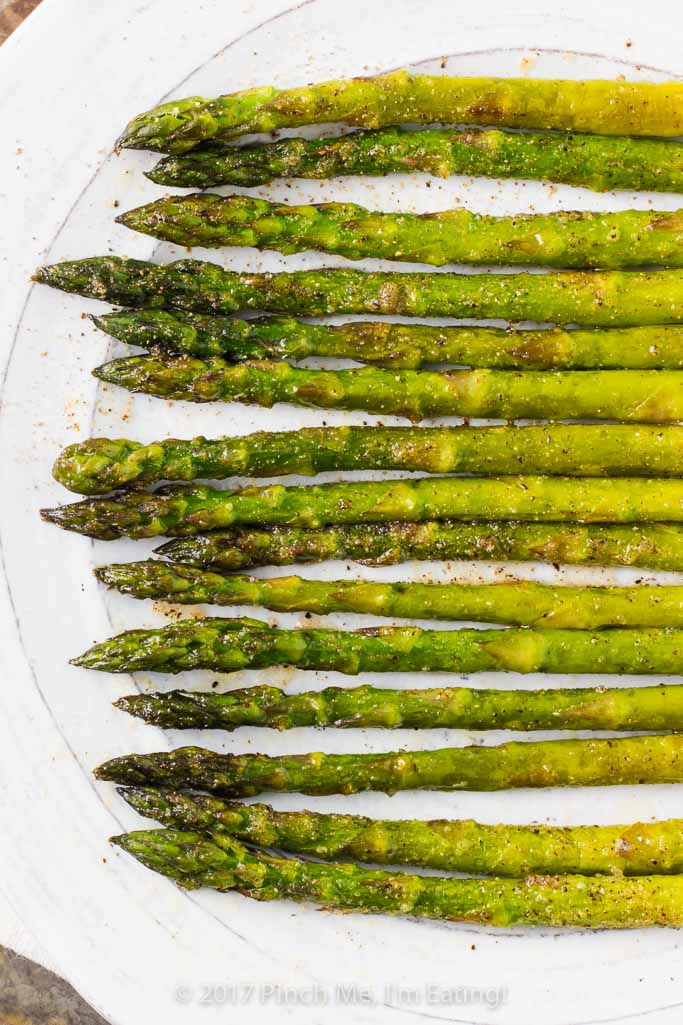 This simply prepared sweet onion oven roasted asparagus is a flavorful side dish that takes no time to whip up for a casual weeknight dinner and is elegant enough for company! 