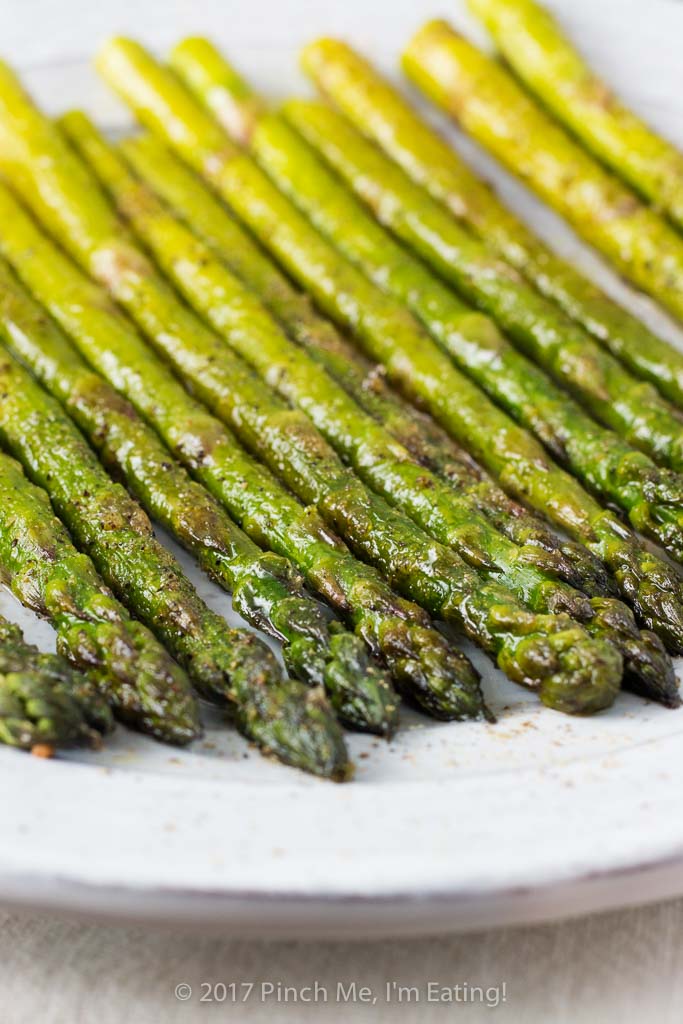 This simply prepared sweet onion oven roasted asparagus is a flavorful side dish that takes no time to whip up for a casual weeknight dinner and is elegant enough for company! 