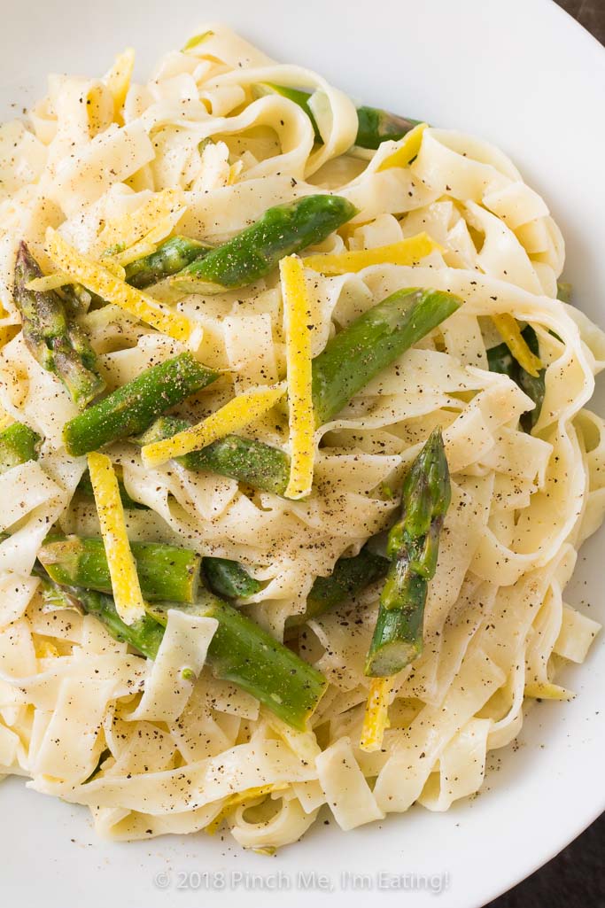 This creamy lemon pasta is simple to make yet decadent, punctuated by thin strips of lemon zest and tender-crisp asparagus pieces to ring in spring flavors!