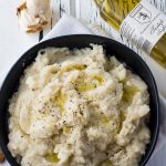 Roasted garlic truffle mashed potatoes are an easy gourmet twist on a classic comfort food. It's a perfect side dish for Thanksgiving, Christmas, or any cozy cool weather meal!