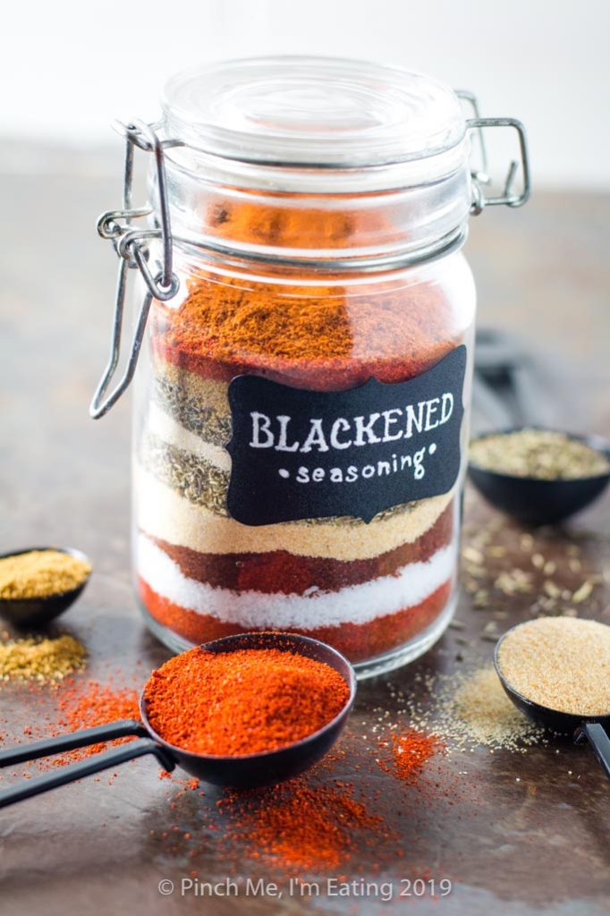 Blackened seasoning in spice jar with spices in different colored layers