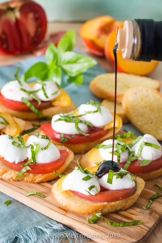 Summer Peach and Heirloom Tomato Crostini