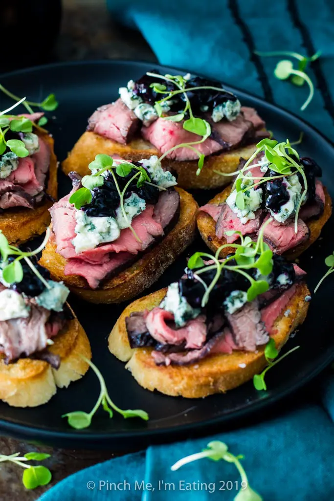 Blue Cheese and Steak Crostini with Blueberry Caramelized Onion Jam