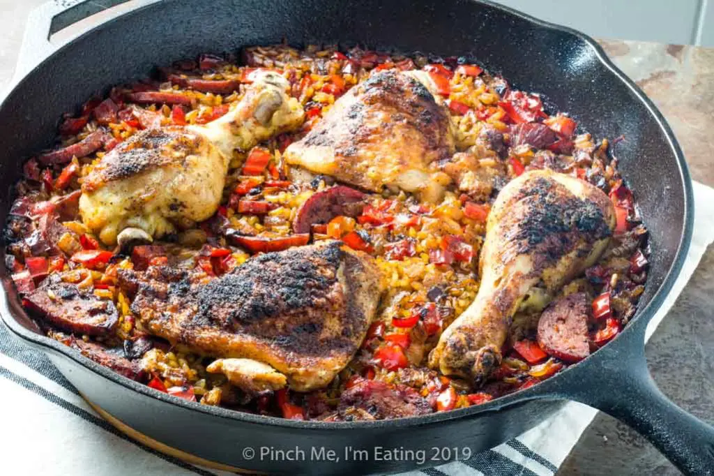 Chicken and chorizo paella in a cast iron skillet