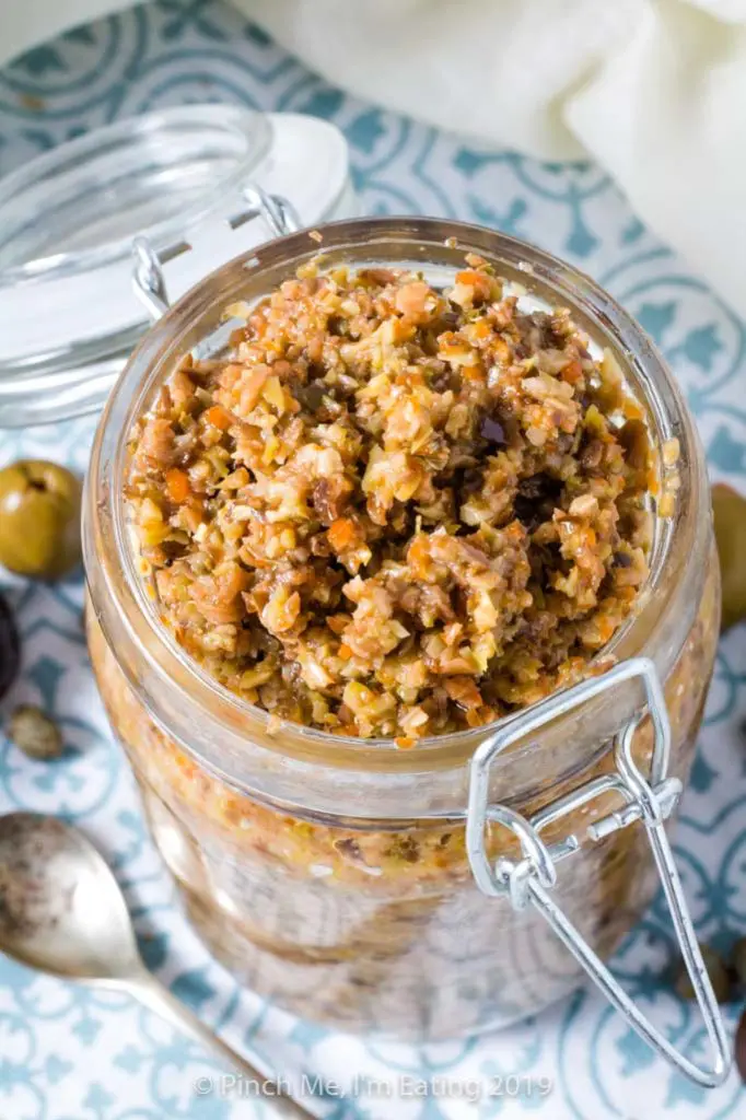 Green and olive tapenade in a jar