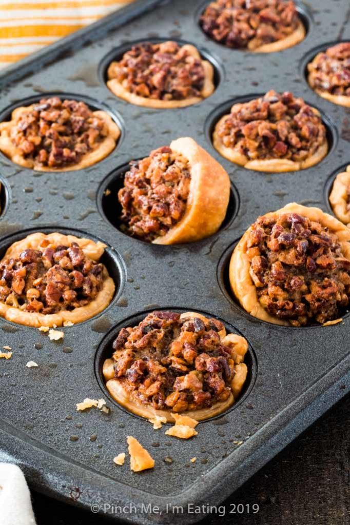 Mini pecan pies in a mini muffin tin