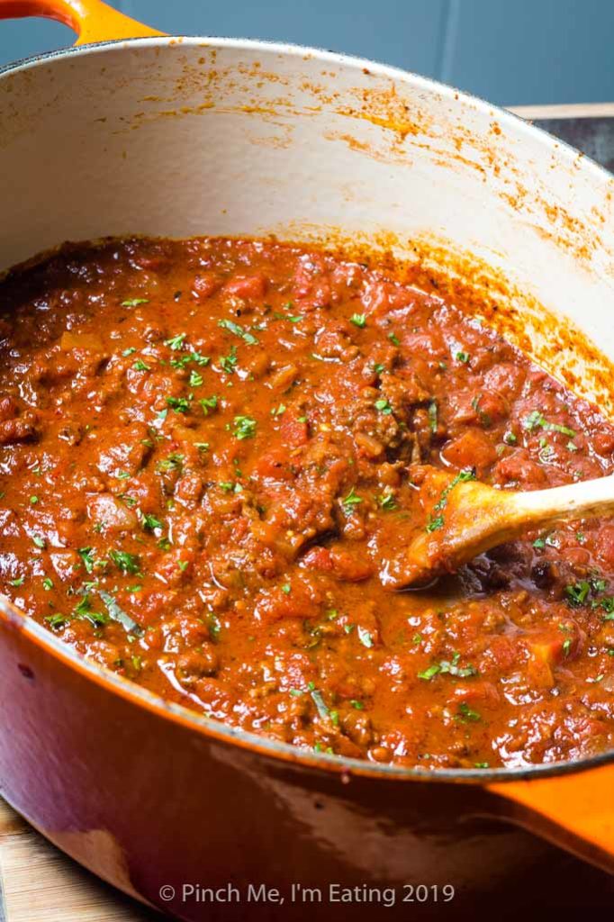 Homemade tomato meat sauce in a Dutch oven