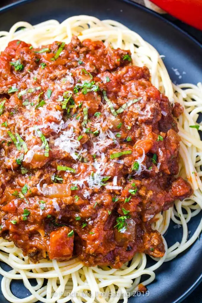 Easy meat sauce recipe served with spaghetti