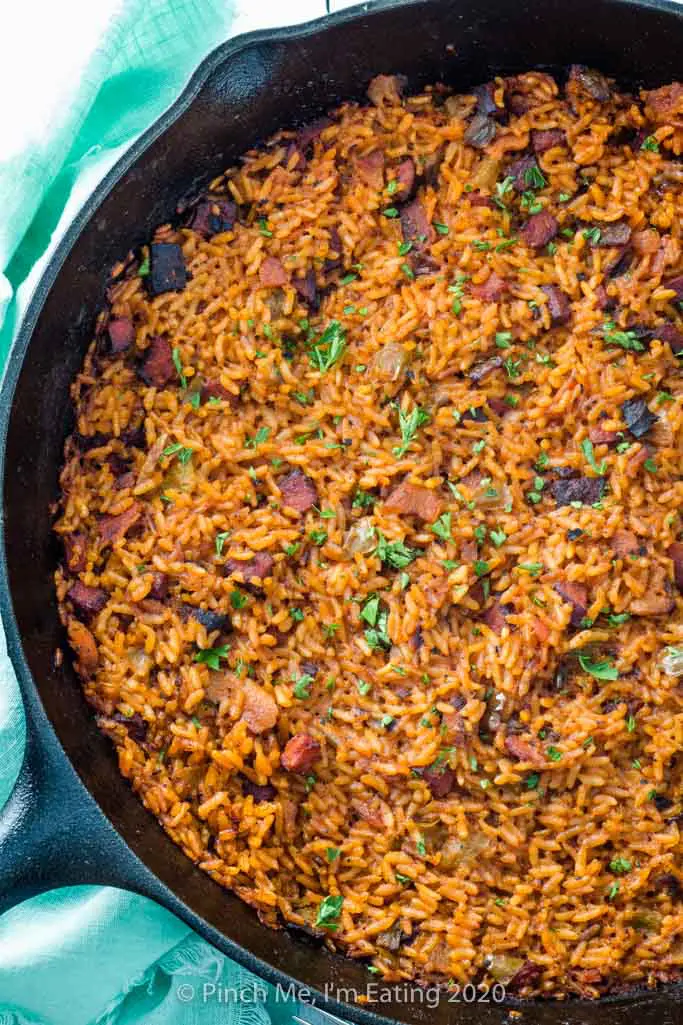 Overhead view of Charleston red rice in a cast iron skillet