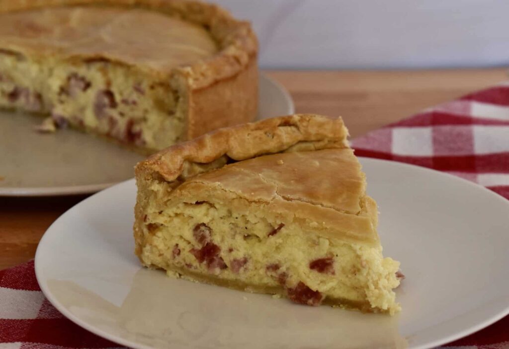 Pizza rustica on a white plate