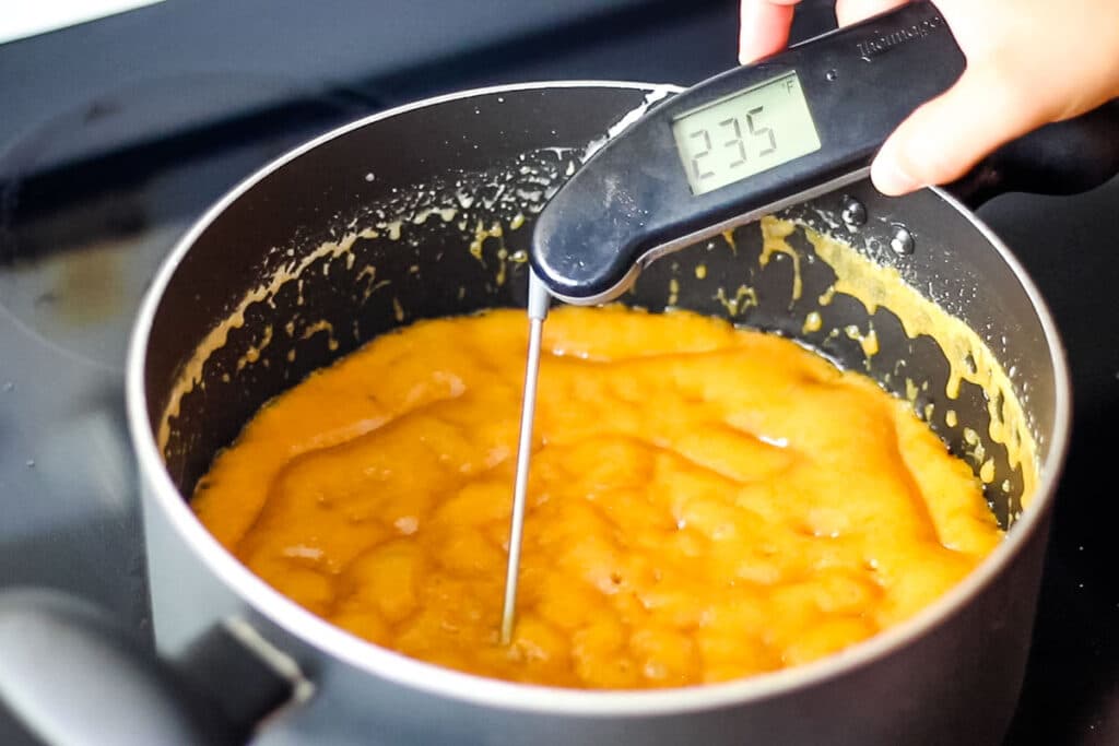 Photo of pecan praline candy mixture at 235 degrees Fahrenheit.