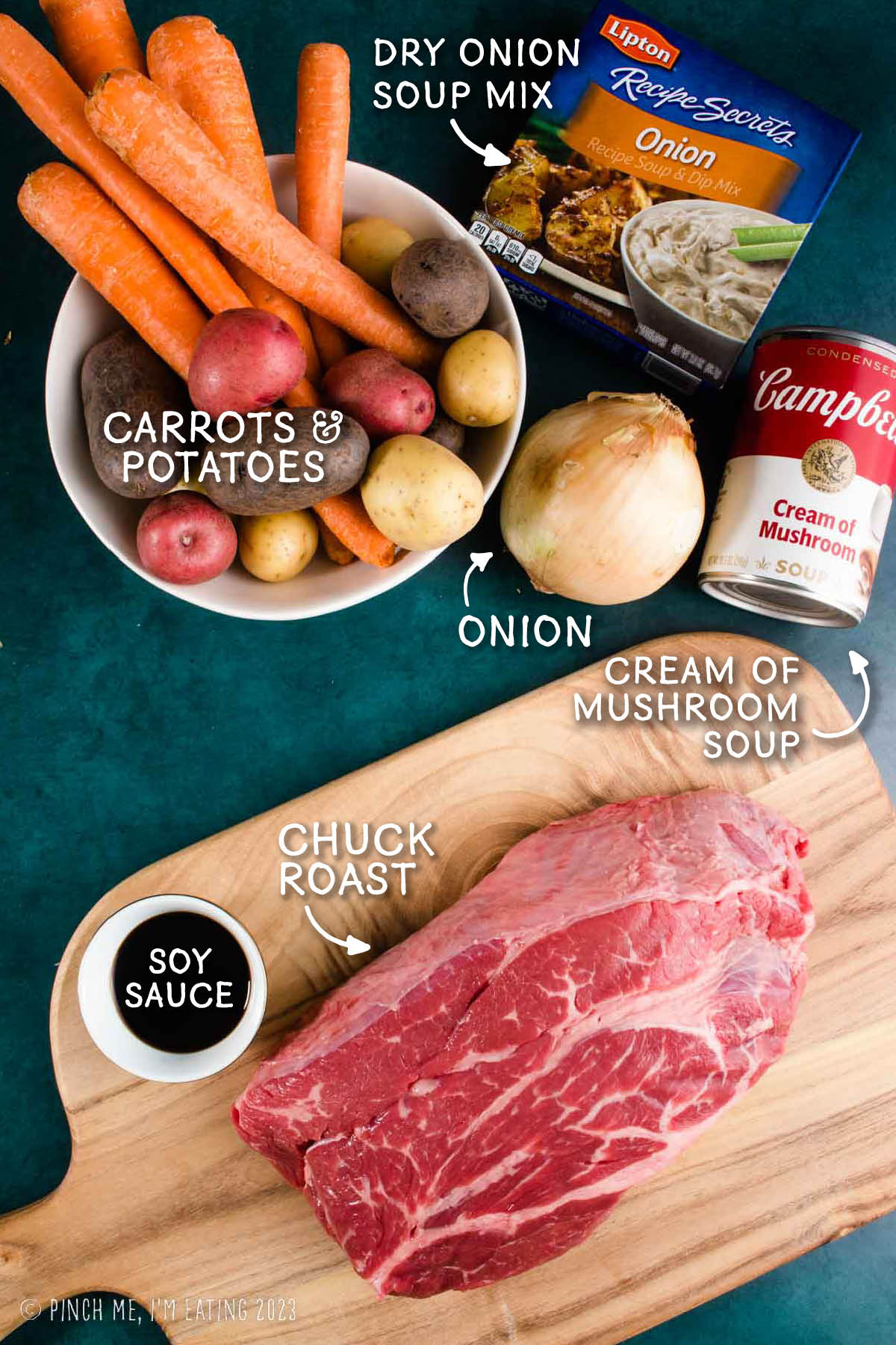 Ingredients for pot roast with onion soup mix, cream of mushroom soup, carrots, and potatoes.