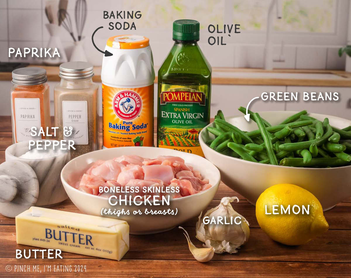 Chicken, green beans, olive oil, butter, baking soda, lemon, garlic, and spices in a labeled ingredient shot.